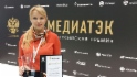 Начальник Службы по связям с общественностью и СМИ ООО «Газпром добыча Уренгой» Наталья Кицова с дипломами
