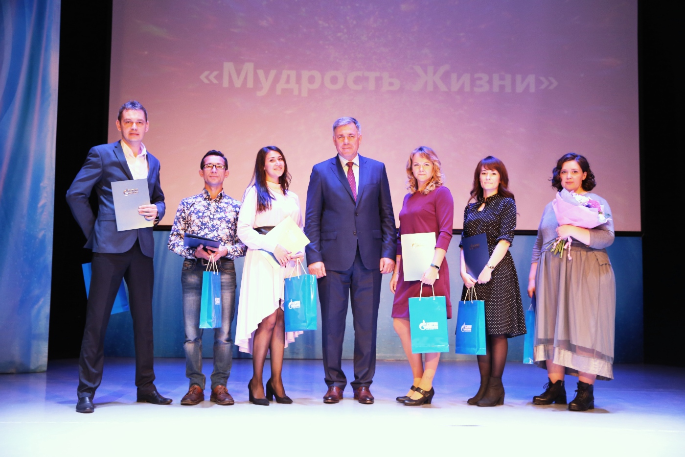 Сергей Сусликов с фотографами-волонтерами