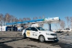 Автомобиль таксопарка на новой АГНКС «Газпром» в городе Томск, на улице Высоцкого, д. 20