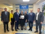 Тульские газовики позируют с благодарственным письмом
