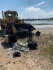 Иногда для уборки требуется тяжелая техника. Водоемы возле города Губкинского
