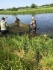 Специалисты Федерального агентства по рыболовству производят специальные замеры для определения количества выпущенных мальков