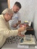 Взвешивание мальков для определения их массы перед выпуском в реку
