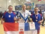 Роман Мозжегоров (в центре) со спортсменами команды Пермского края по гиревому спорту
