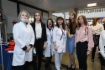 Участники мероприятия у информационного стенда медико-санитарной части