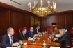Алексей Миллер (второй слева) и Президент компании Comita Данило Дуракович (справа) во время рабочей встречи