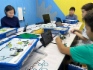Обучающиеся кружка робототехники Районного детско-юношеского центра города Олёкминска создают новые модели роботов с помощью планшетов