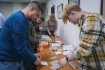 Молодые специалисты компании за сборкой комплектов сухого душа