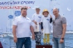 Генеральный директор «Газпром добыча шельф Южно-Сахалинск» Валерий Гурьянов (слева) и заместитель генерального директора компании по корпоративной защите и управлению персоналом Геннадий Гаврилин награждают самых юных участников турнира